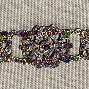 Vintage VLCL marked multicolor rhinestones bracelet. 7.25" to 8.5" 1980's